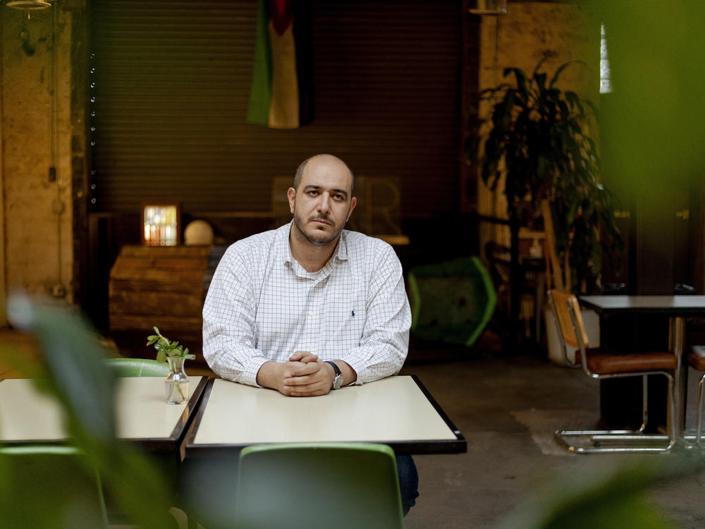 Dearborn Mayor Abdullah Hammoud sits at Jabal Coffee House in downtown Dearborn on Thursday.