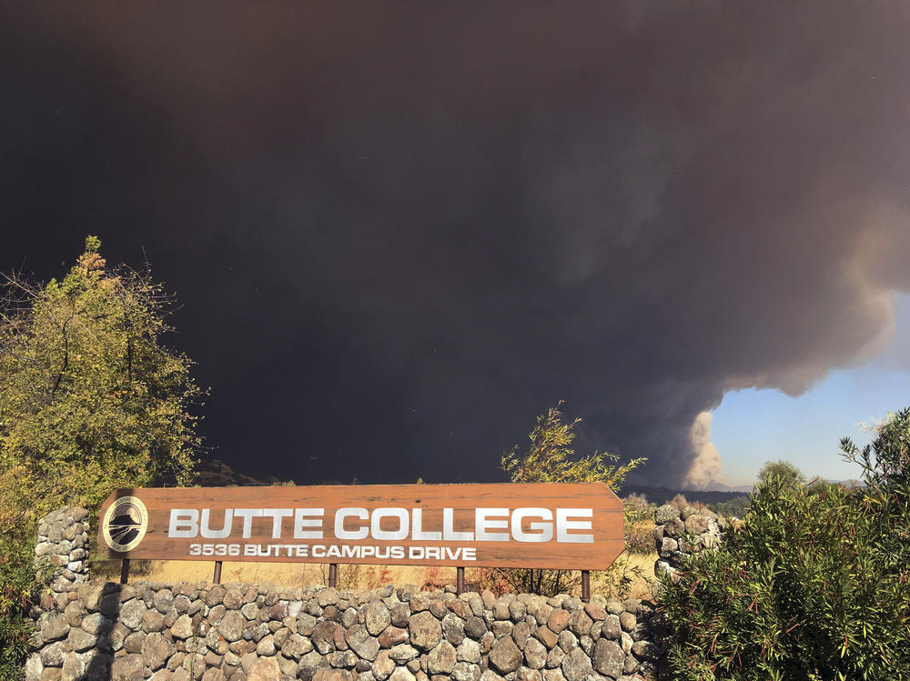Smoke from the 2018 Camp Fire, which destroyed Paradise, Calif., darkens the sky above Butte College. Many colleges and universities are changing the way they support students after disasters, in an effort to keep students enrolled and on track for graduation.