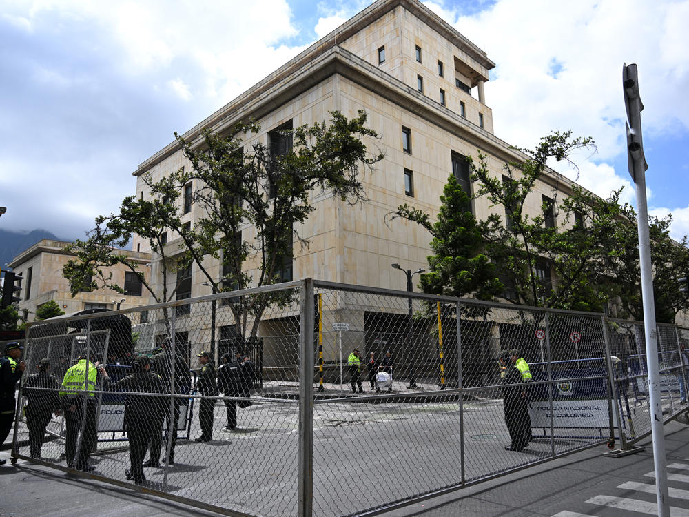 Members of the Colombian Police watch over the Supreme Court of Justice headquarters during the election of the new attorney general of the nation in Bogotá on Feb. 22.