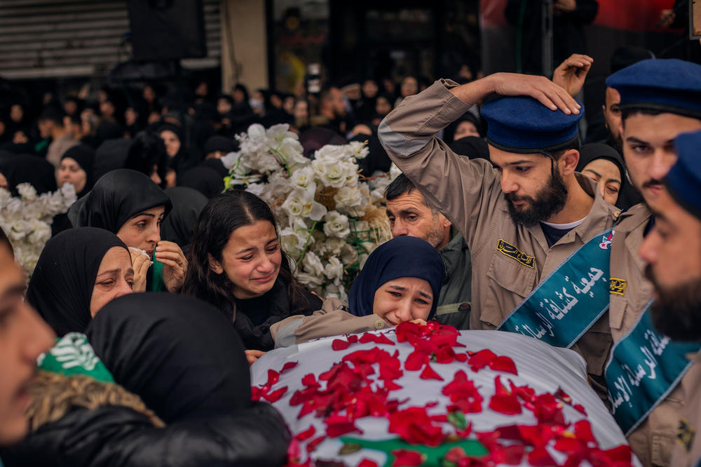On Feb. 17, relatives mourn the seven members of the Berjawi family who were killed in their home by Israeli rockets, in the southern Lebanese city of Nabatieh.