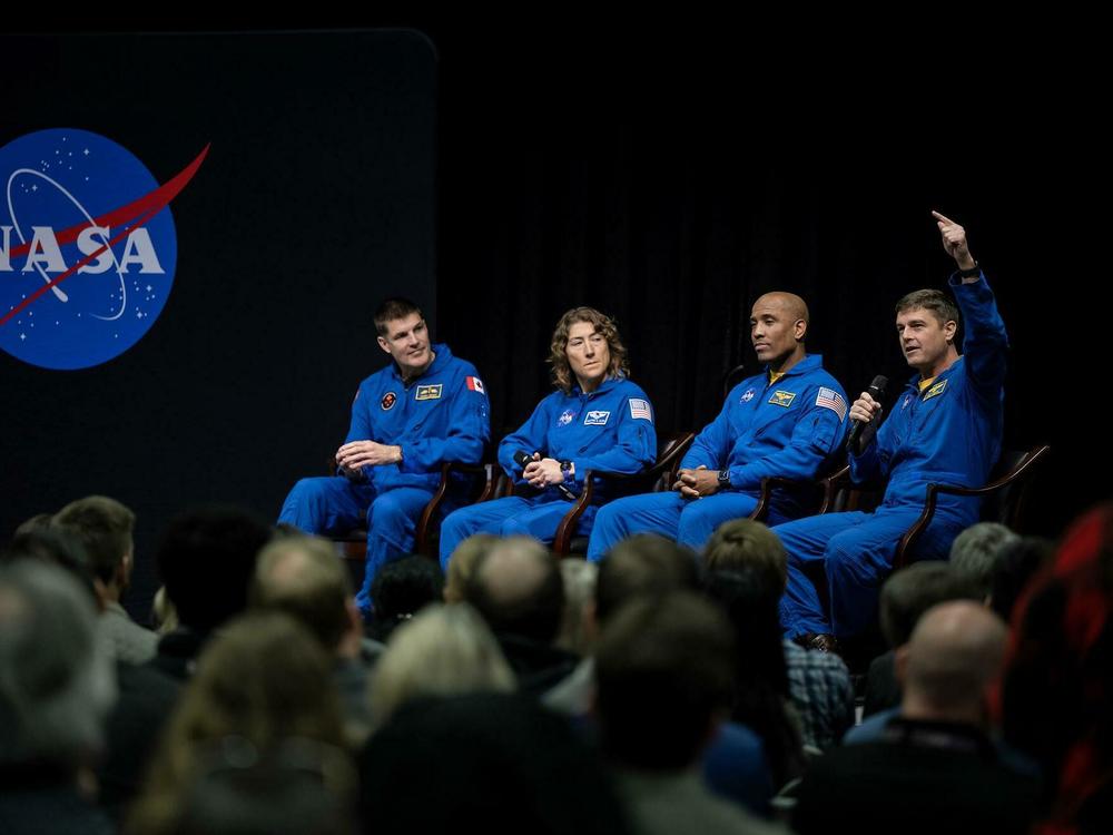 Artemis II commander Reid Wiseman (right) makes a point during a visit to NASA's Marshall Space Flight Center in Huntsville, Ala., in November. Canadian astronaut Jeremy Hansen is seated at left, next to Christina Koch and Glover.