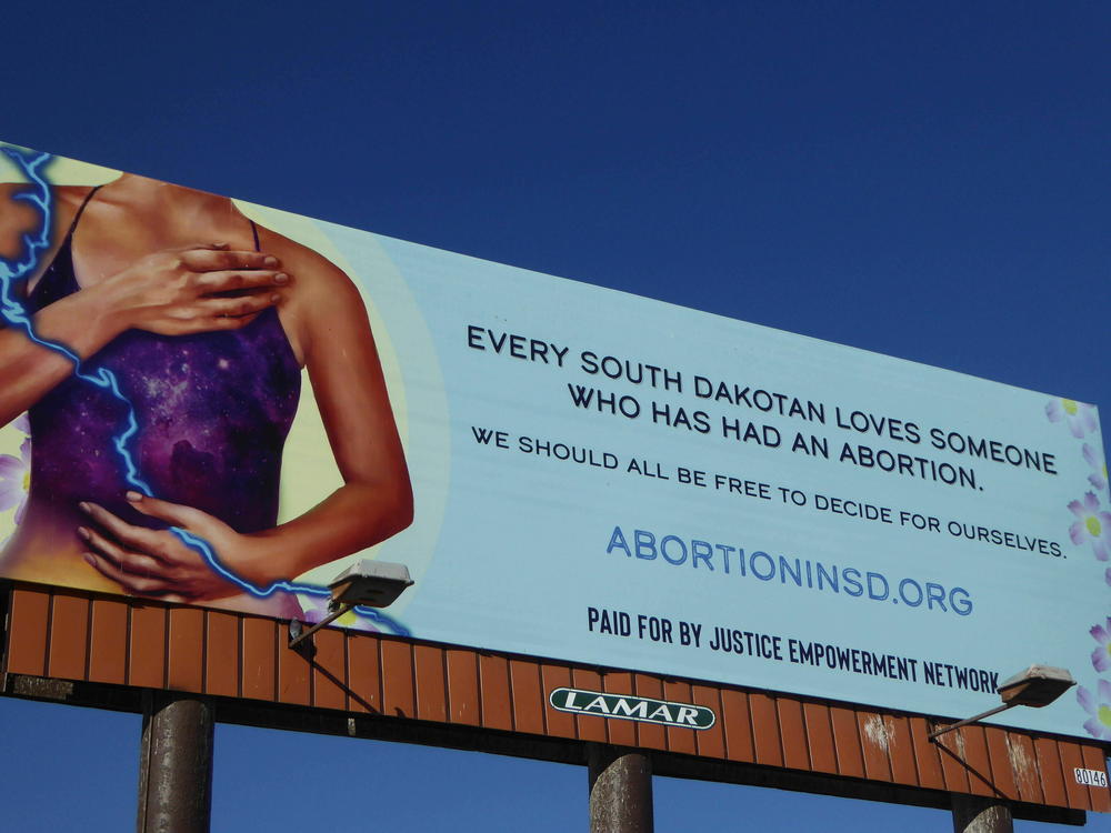 The Justice through Empowerment Network, a South Dakota abortion fund, placed billboards across the state, including this one along the interstate in Rapid City.