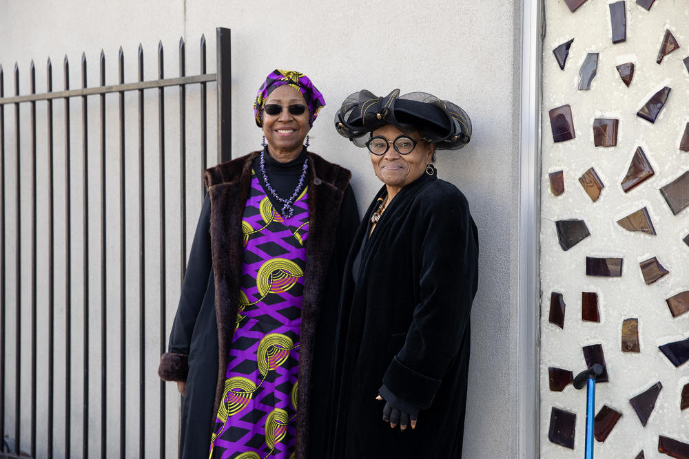 Velma Matthews, 76, left, and Lovie Hatcher, 74, pose for a portrait outside Greater New Mt. Moriah Missionary Baptist Church on Sunday.
