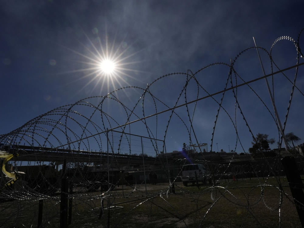 Concertina wire stretches through Shelby Park on Feb. 4, 2024, in Eagle Pass, Texas.