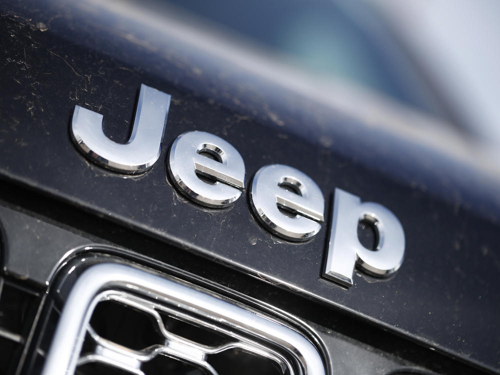The Jeep logo is seen in the south Denver suburb of Englewood, Colo., on April 15, 2018. Chrysler is recalling more than 330,00 Jeep Grand Cherokees because of a steering wheel issue that may cause drivers to lose control of their vehicles.