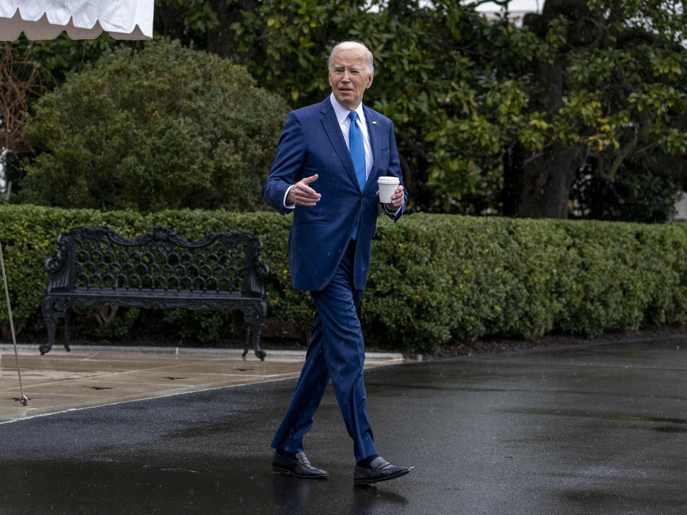 President Biden walks out of the White House on Wednesday to board Marine One for a short trip to Walter Reed National Military Medical Center in Bethesda, Md., for his annual physical.