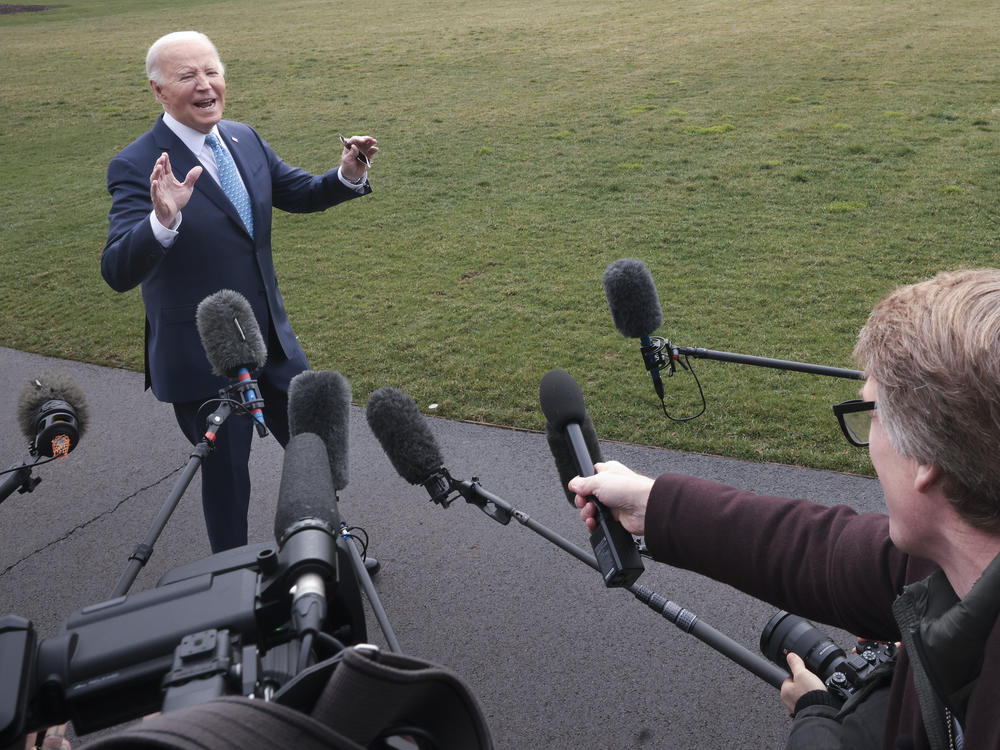 Joe Biden answers questions while leaving the White House on January 30.