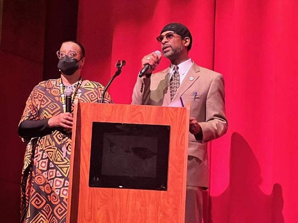 Alexandria City High School drama teacher Leslie Jones, left, speaks alongside social studies teacher Ra Alim Shabazz