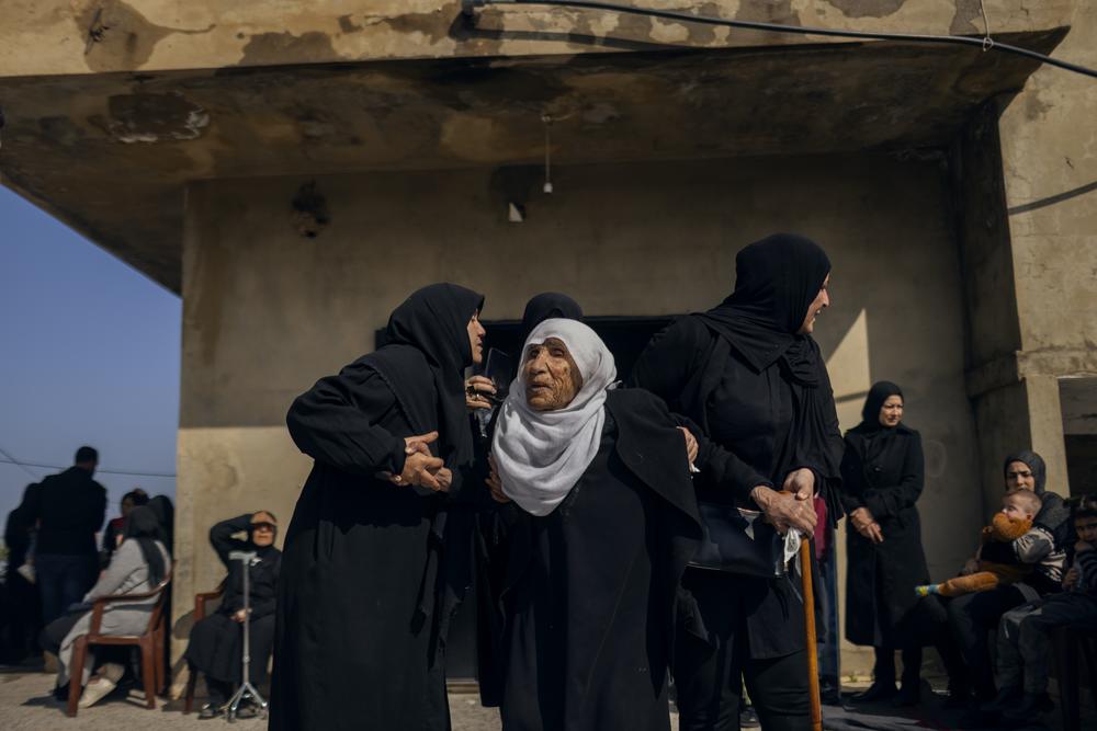 Relatives of Amal Hassan al-Durr grieve for her on Feb. 22 after she was killed during an Israeli attack the day before, in Majdal Zoun, Lebanon.