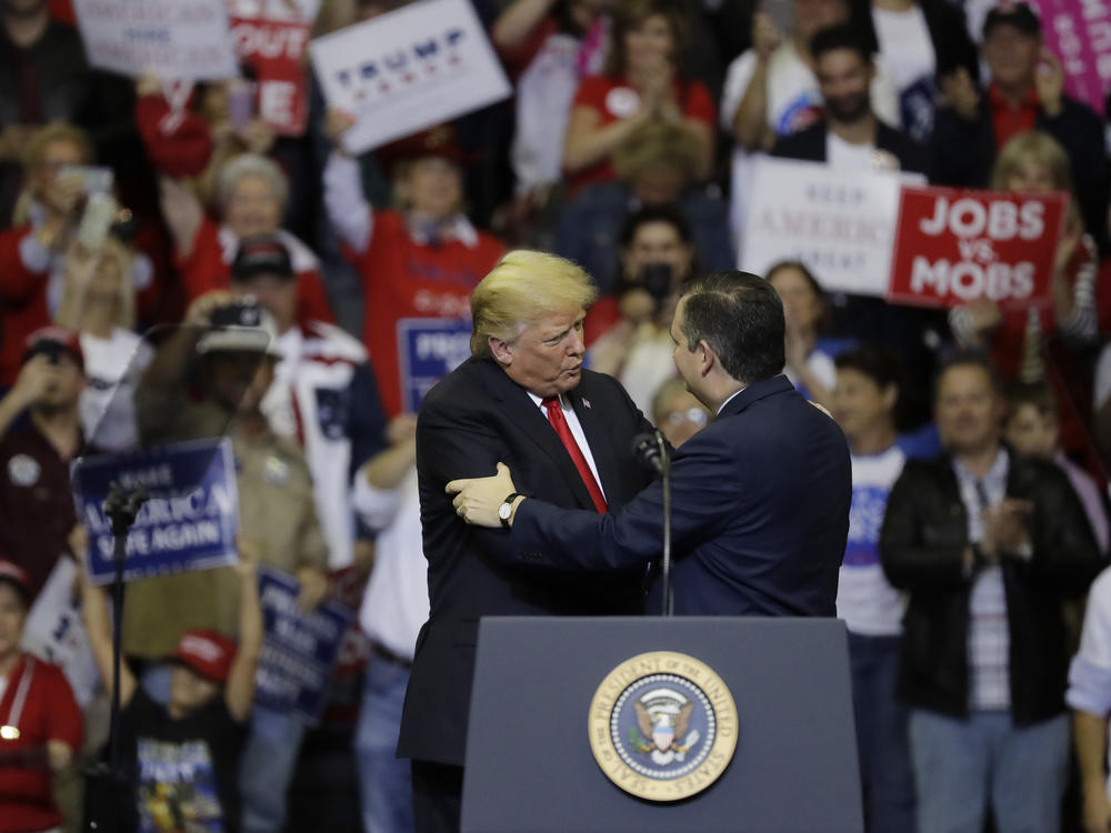 President Donald Trump, left, embraces Sen. Ted Cruz, R-Texas, during a campaign rally, Monday, Oct. 22, 2018, in Houston.