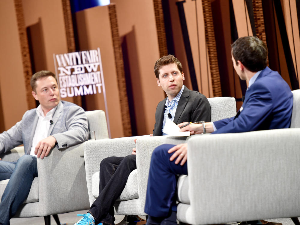 From left, Elon Musk, Sam Altman and Andrew Ross Sorkin, <em>New York Times</em> financial columnist, speak  during the Vanity Fair New Establishment Summit at Yerba Buena Center for the Arts on Oct. 6, 2015, in San Francisco.