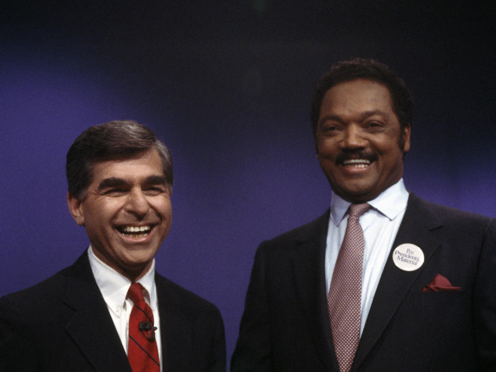 Massachusetts Gov. Michael Dukakis campaigns for presidency in San Francisco in 1992, where he is supported by a former candidate to the Democratic Party nomination, Rev. Jesse Jackson of Illinois.