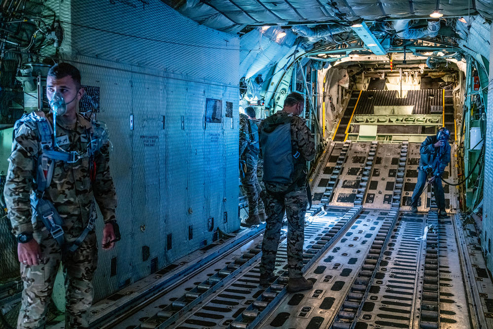 Jordanian Air Force personnel inside a C-130 aircraft afterl air-dropping  pallets of aid over Gaza.