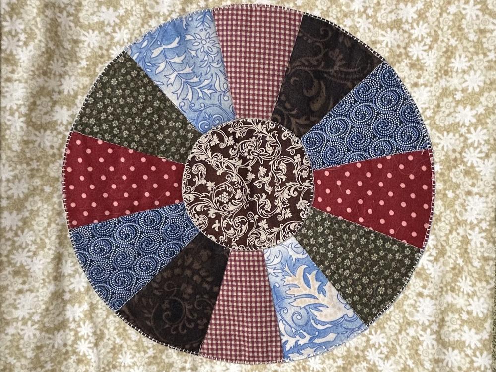 The wagon wheel quilt block indicated that a safe wagon or cart was on its way.