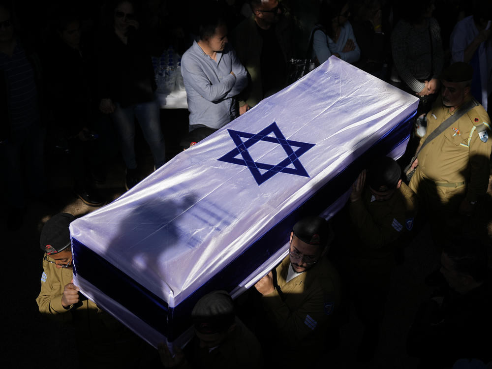 Israeli soldiers carry the casket of Sergeant Oz Daniel during his funeral in Kfar Saba, Israel, on Monday, Feb. 26.