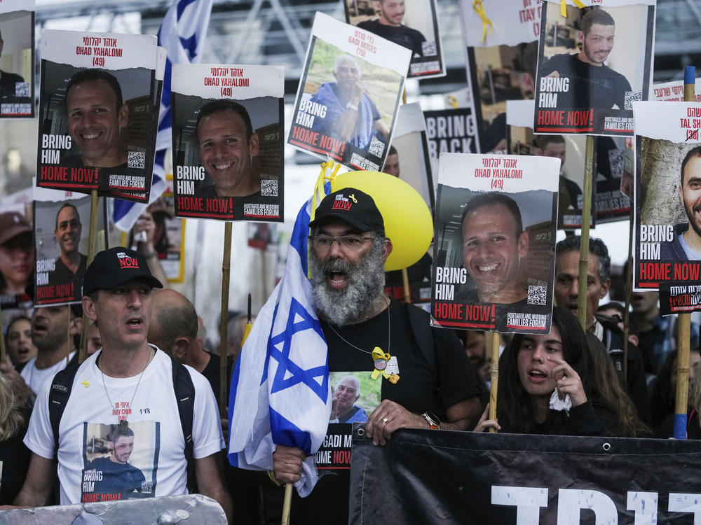 Family and supporters of the hostages held captive by Hamas in Gaza complete the final leg of a four-day march from the Israel-Gaza border to Jerusalem, to demand the immediate release of all hostages, in Jerusalem, on Saturday.