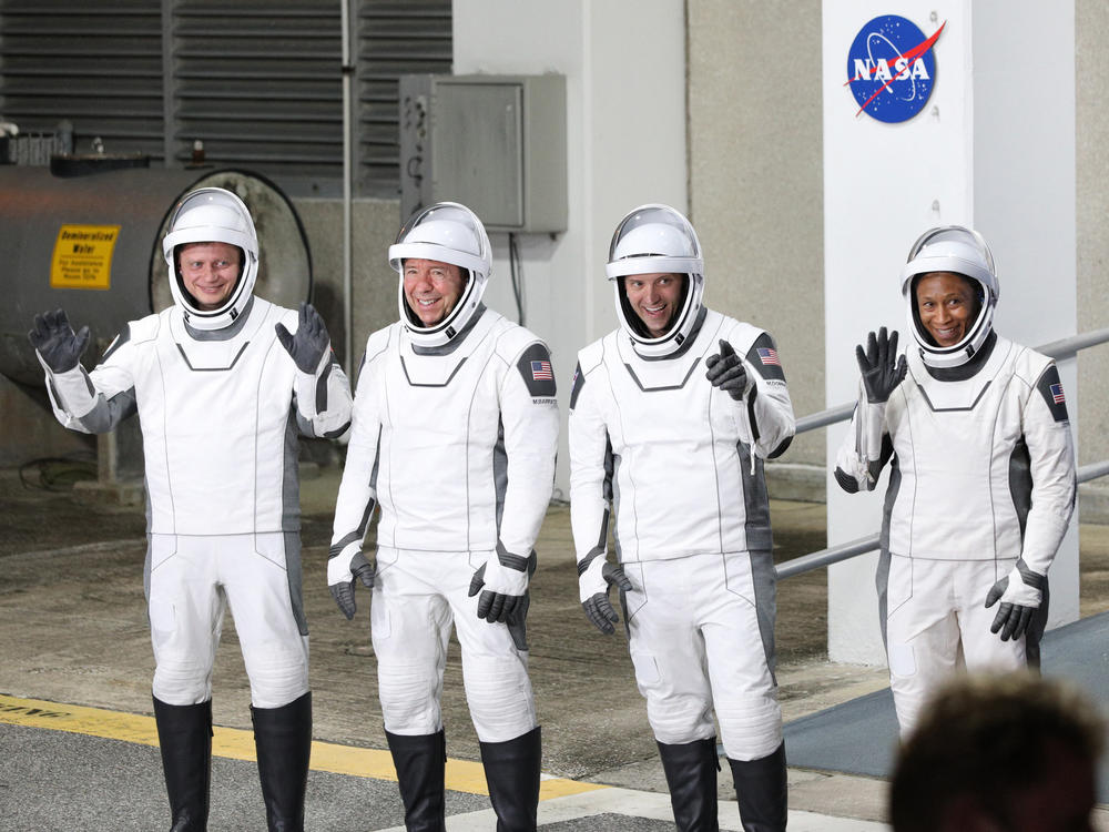 Members of NASA's Crew-8 mission pause before heading to launch complex 39A at the Kennedy Space Center in Florida on March 3, 2024. They are (from L) Roscosmos cosmonaut and mission specialist Alexander Grebenkin, NASA astronaut and pilot Michael Barratt, NASA astronaut and commander Matthew Dominick and NASA astronaut and mission specialist Jeanette Epps.