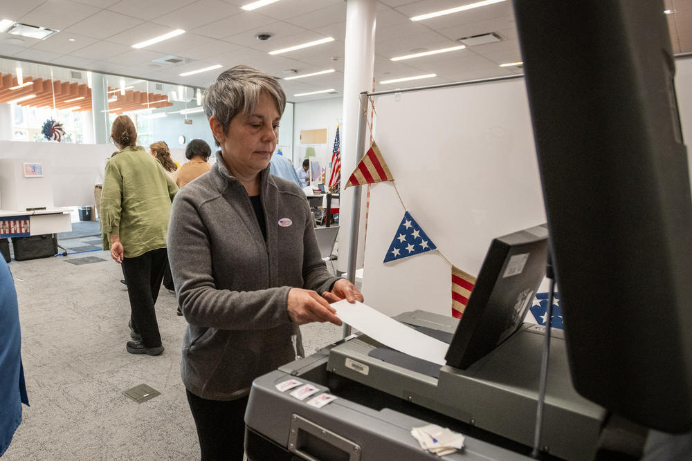 Christine Ecker votes on Sunday in Charlotte, N.C., the last day of early voting ahead of Super Tuesday. The state is one of 16 holding contests on the biggest primary election day of the 2024 cycle.