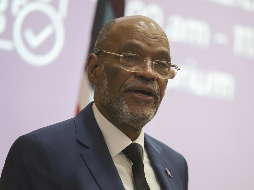 Haiti's Prime Minister Ariel Henry gives a public lecture at the United States International University in Nairobi, Kenya, on Friday. Henry said elections in his country need to be held as soon as possible to bring stability to the troubled Caribbean nation.