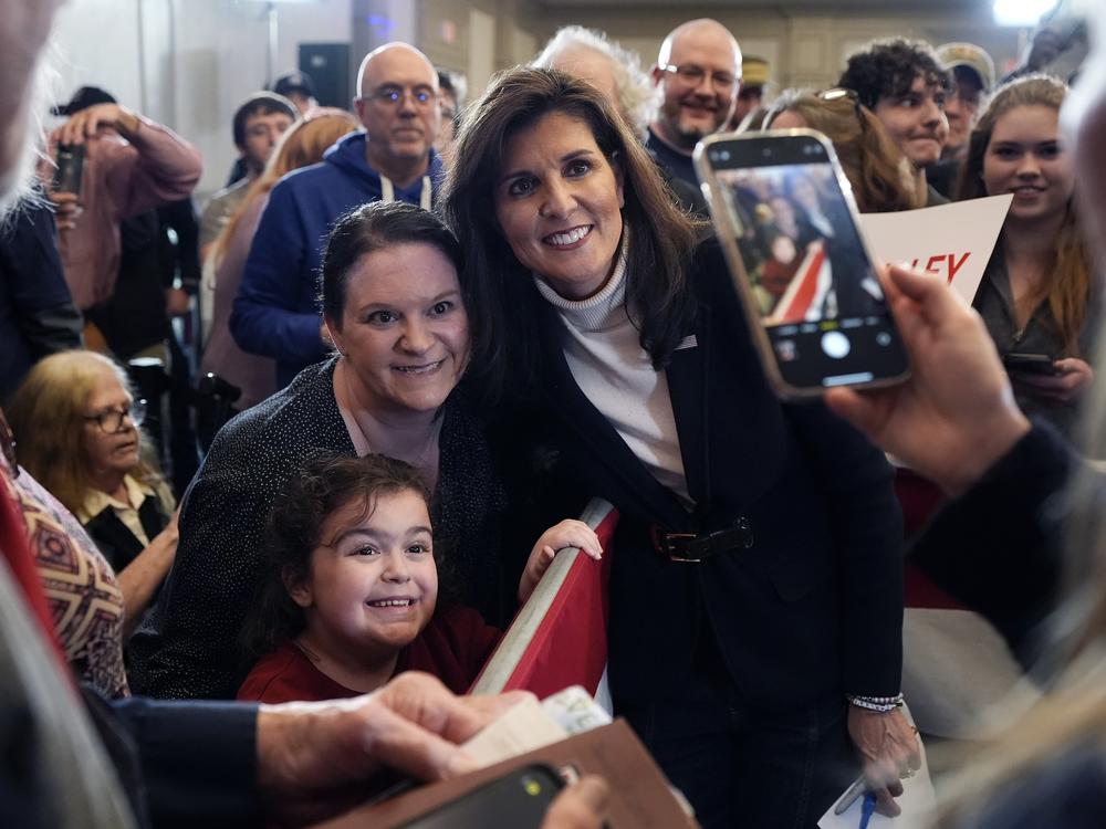 Republican presidential candidate former U.N. Ambassador Nikki Haley poses for a selfie after speaking at a campaign event in South Burlington, Vermont, Sunday, March 3, 2024.