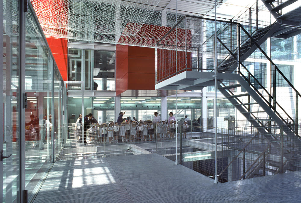 A central atrium in the Hiroshima Nishi Fire Station spotlights the work and training of the firefighters. A lobby and terrace are open for public use.