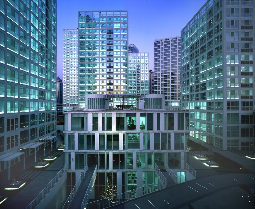 At Beijing's Jian Wai SOHO, traffic is diverted underground to maximize pedestrian space.