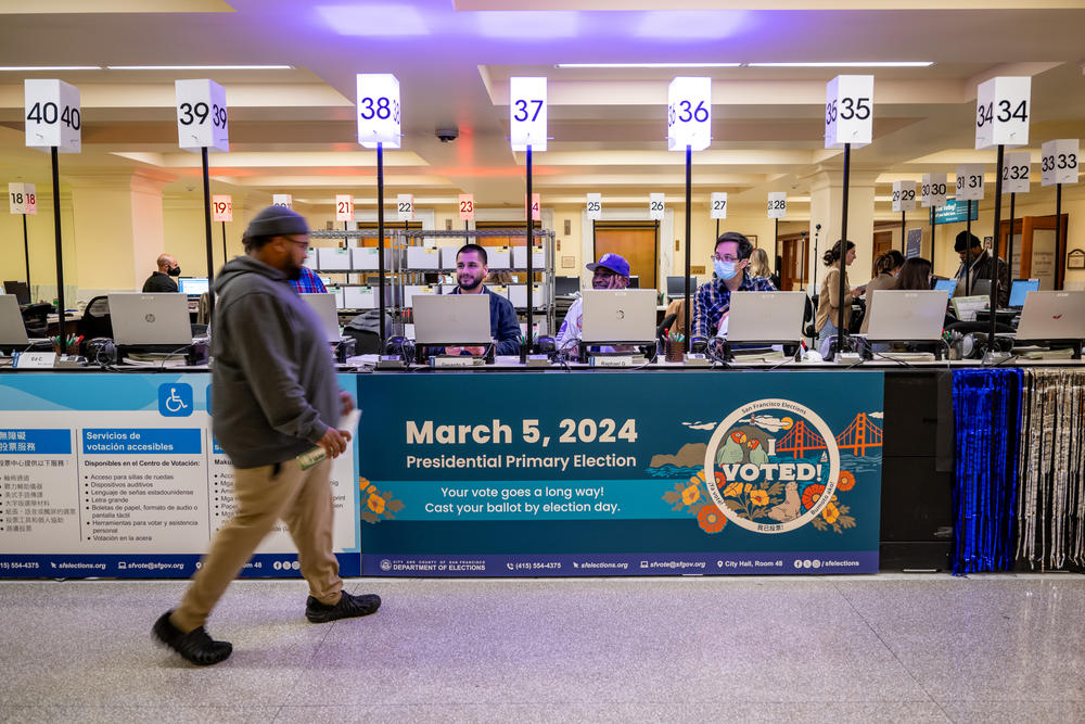 Voters cast their ballots on Super Tuesday at City Hall in San Francisco.