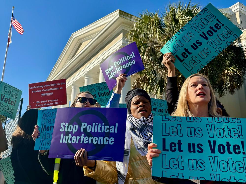 Abortion access advocates are chanting and waiving signs outside the Florida Supreme Court. Inside, justices have just heard arguments on the ballot language for a proposed state constitutional amendment that would protect abortion access up to the point of viability.