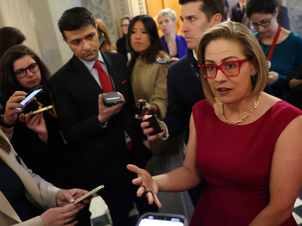 U.S. Sen. Kyrsten Sinema, I-Ariz., speaks to reporters at the U.S. Capitol on Feb. 5 in Washington, D.C.