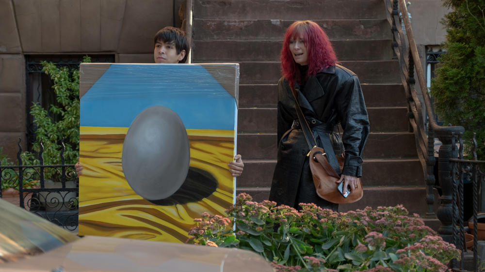 Julio Torres as Alejandro Martinez and Tilda Swinton as Elizabeth in the film <em>Problemista</em>.