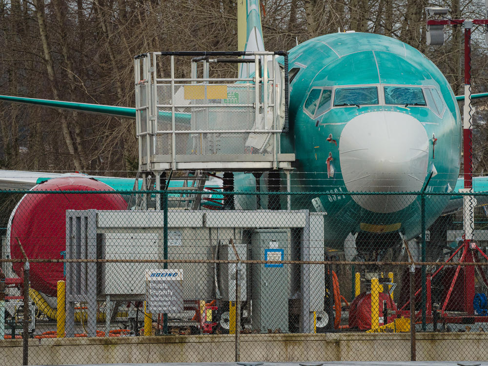 A unfinished Boeing 737 Max sits outside Boeing's manufacturing facility in Renton, Wash., on Feb. 27, 2024. The top federal safety investigator says Boeing still has not provided key information that could shed light on what went wrong when a door plug blew off an in-flight 737 Max 9 in January.