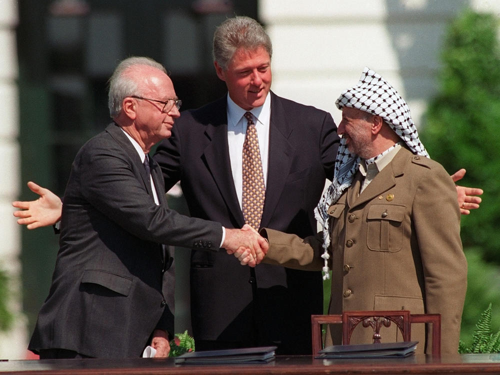 U.S. President Bill Clinton presides over the 1993 peace accords signed at the White House by Israeli Prime Minister Yitzhak Rabin (left) and Palestinian leader Yasser Arafat. The aim was a negotiated deal ending decades of conflict between the two sides. But no agreement was reached. Today there's talk about recognizing a Palestinian state first and then negotiating the details afterward.