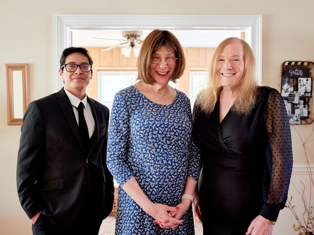 (From left to right) Portrait of Patrick Buenaventura, Bernie Wagenblast, and Nicole Brownstein, wearing their award ceremony attire at Wagenblast's house in Cranford, NJ, on Monday, Feb. 19, 2024.