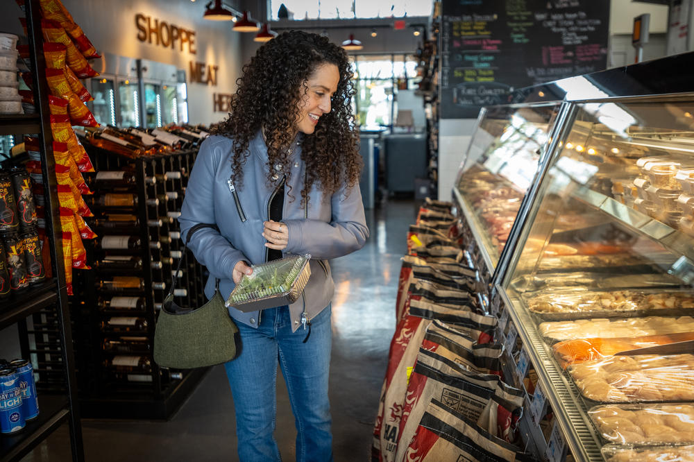 Karen Seagraves browses the selections at The New York Butcher and Wine Shoppe in Charlotte, N.C.