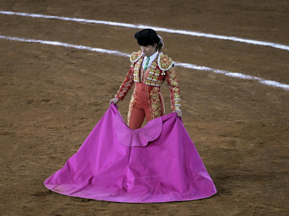 Mexican bullfighter Hilda Tenorio participates in a bullfight event at the Monumental Plaza de Toros Mexico in Mexico City on Feb. 9. Bullfighting resumed Feb. 4 in the capital after it was banned in 2022.