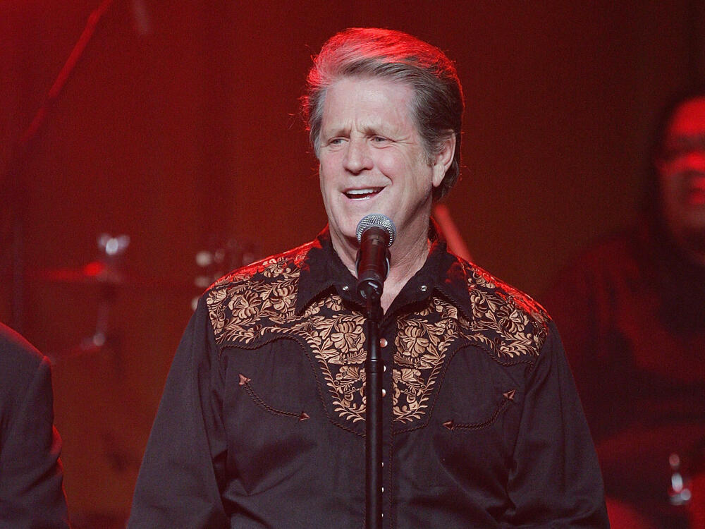 Brian Wilson, smiling, at a Paul Simon tribute concert in 2005.