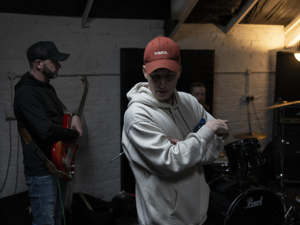 The Shan Vans, an Irish-language rock band, during a practice session at the Blackstaff Mill music studios in West Belfast, Northern Ireland, on Feb. 9. Frontman Jake Mac Siacais said their new song focuses on celebrating Ireland's history but also explores anticolonial struggles in Ireland and the Palestinian territories.