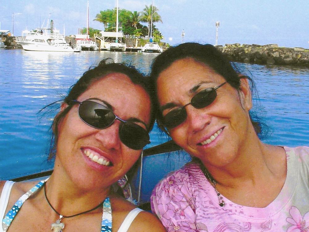 Garay-Serratos and her mother, María Pánfila, smile as they float on a catamaran during a 2006 trip to Hawaii. Pánfila loved being in the ocean, her daughter said.