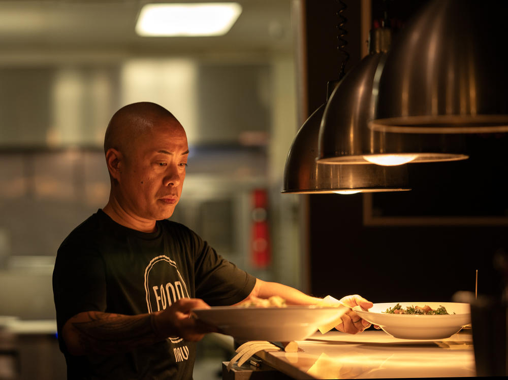 Chef Jojo Vasquez in the open kitchen of FOND – a Neighborhood Eatery, in west Maui.