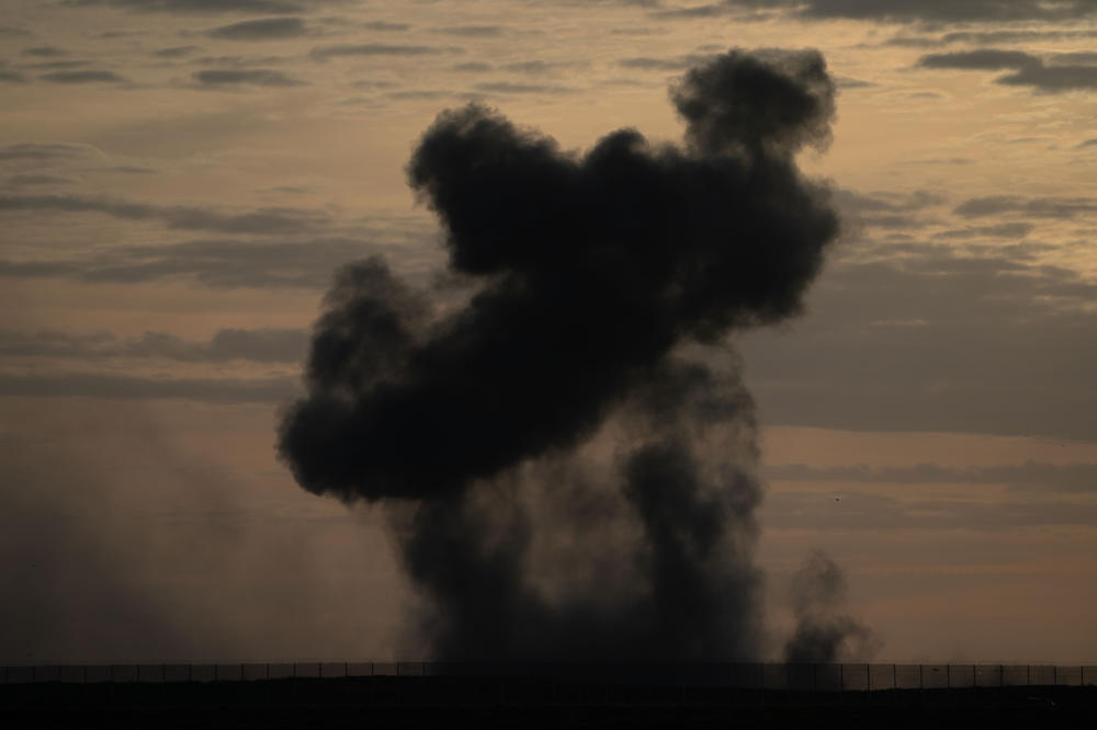 Smoke rises from an airstrike in Gaza, as seen from Israel's southern border with the Gaza Strip, on Thursday.