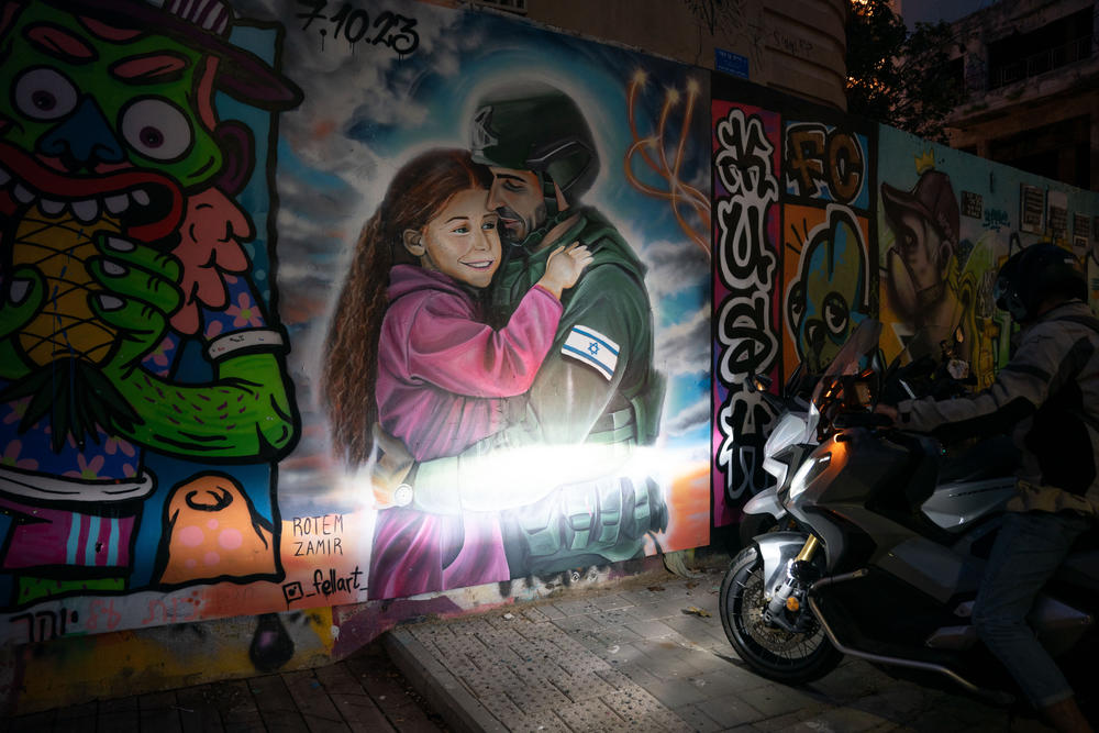 Graffiti murals put up after Oct. 7 in Tel Aviv, Israel.