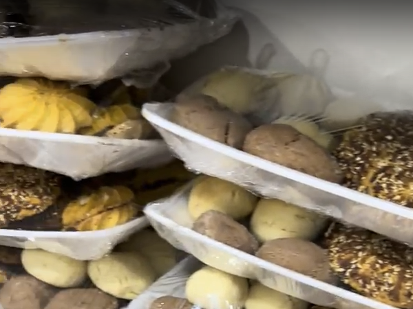 Abu Hani struggles to find ingredients and buys black-market flour to continue to bake for customers in Gaza.