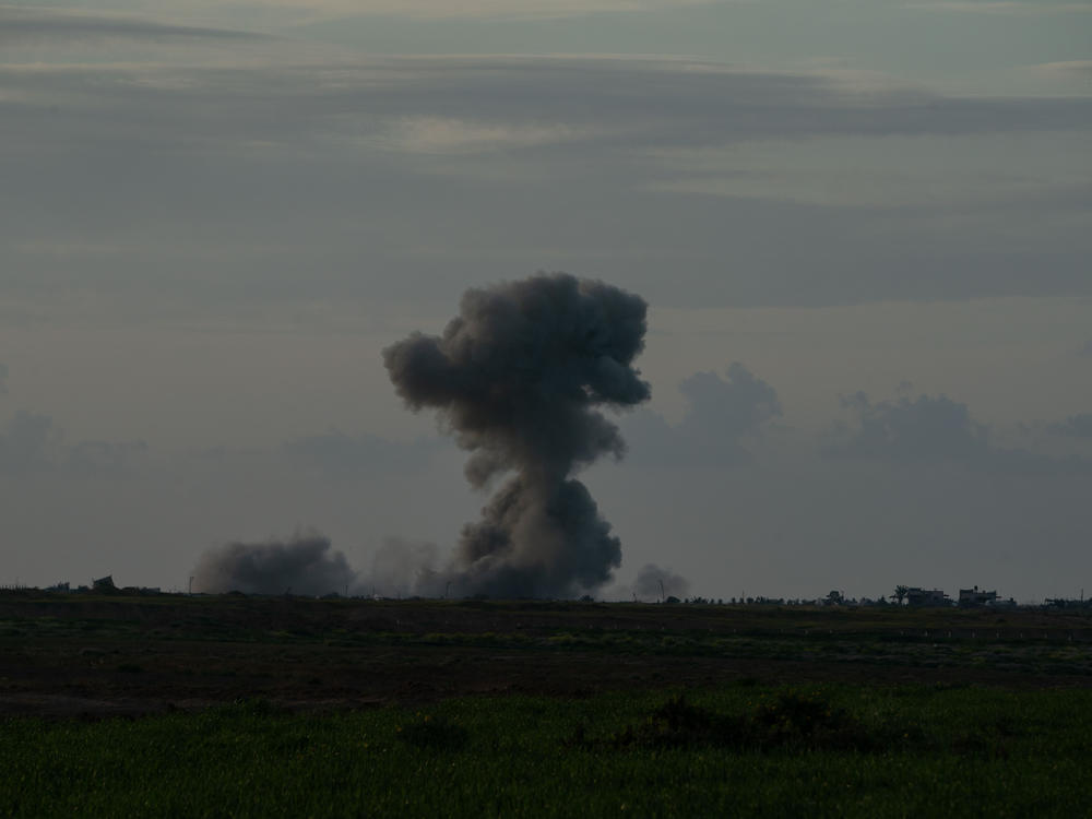 Smoke rises from an air strike on Gaza as seen from Israel's southern border with the Gaza Strip on Thursday, March 7.