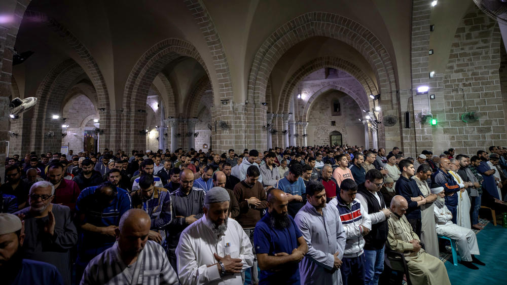Palestinians perform the last Tarawih prayer during the holy month of Ramadan at the Omari Mosque in old Gaza on April 30, 2022 in Gaza City, Gaza.