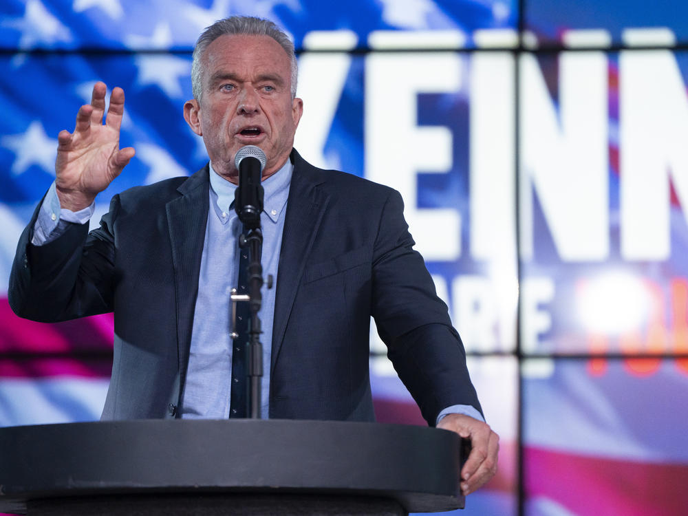 Independent presidential candidate Robert F. Kennedy Jr. speaks during a campaign rally in Phoenix on Dec. 20, 2023. Both Kennedy's campaign and a super PAC supporting him are working to get the conspiracy theorist on state ballots around the country.
