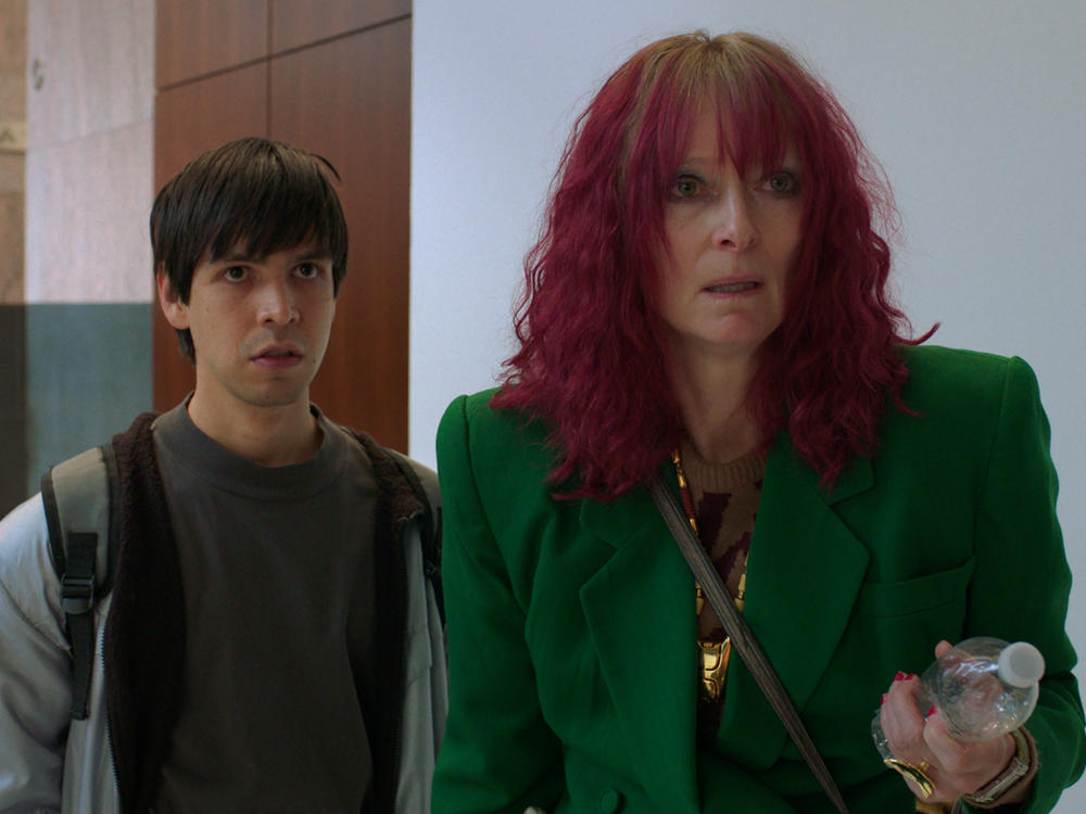Julio Torres as Alejandro and Tilda Swinton as Elizabeth in <em>Problemista</em>.