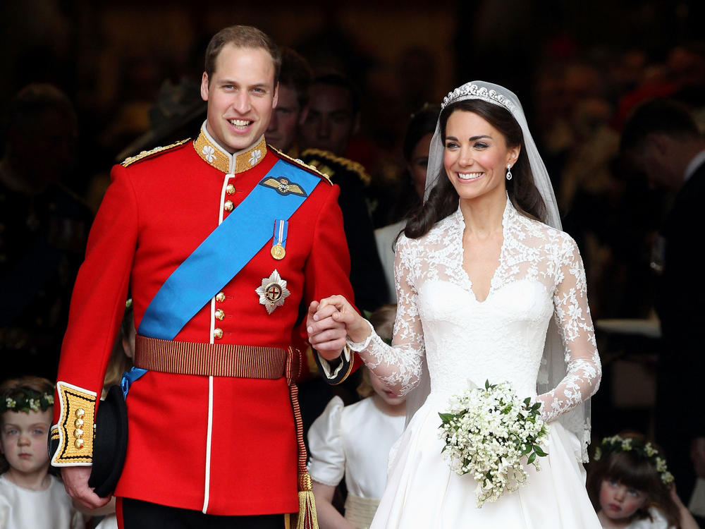 Prince William and Kate smile following their marriage at Westminster Abbey on April 29, 2011.
