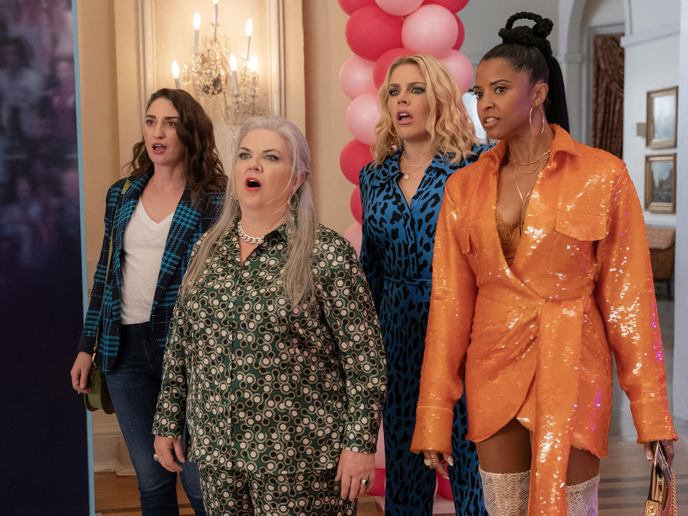 Sara Bareilles, Paula Pell, Busy Philipps, and Renee Elise Goldsberry in a season three episode of <em>Girls5eva</em>.