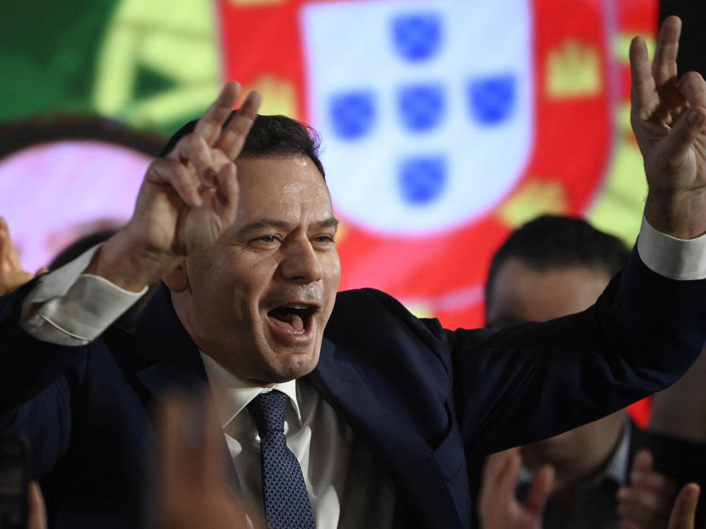 Democratic Alliance (AD) leader Luis Montenegro celebrates his victory as he addresses supporters at the party's election night headquarters, in Lisbon on March 10, 2024.