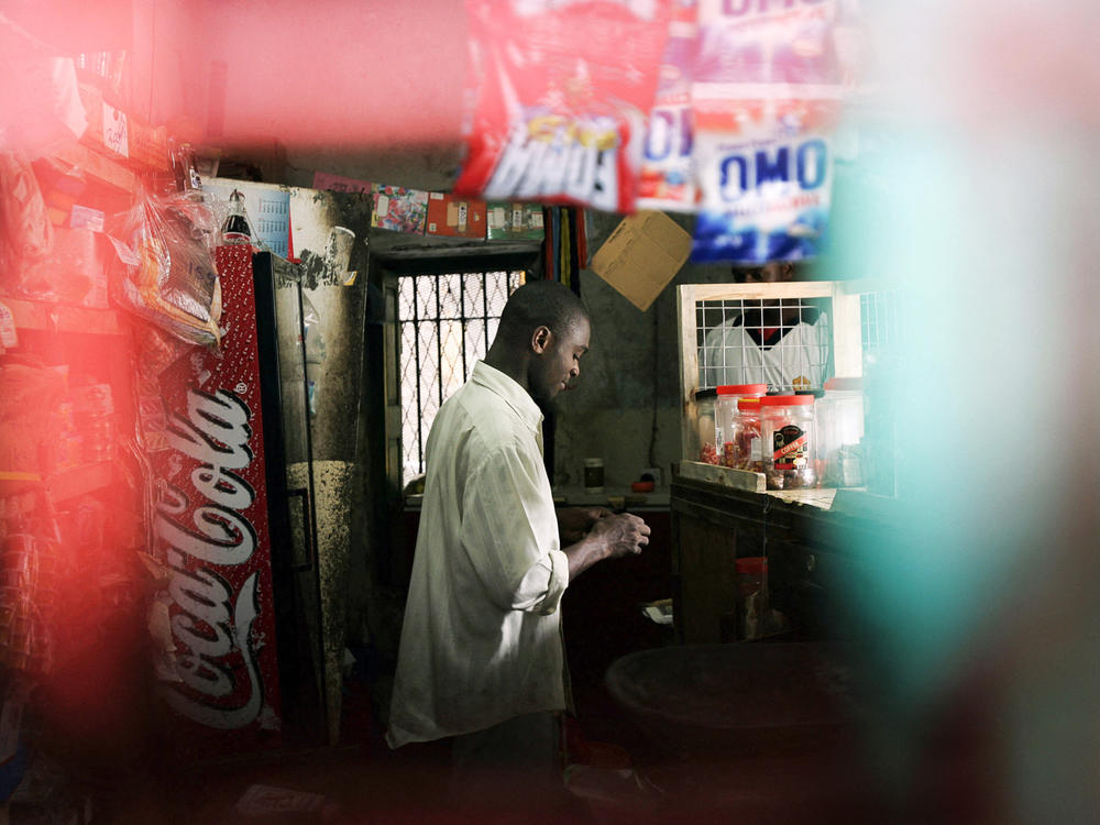 A shopkeeper win Zanzibar, photographed in 2005.